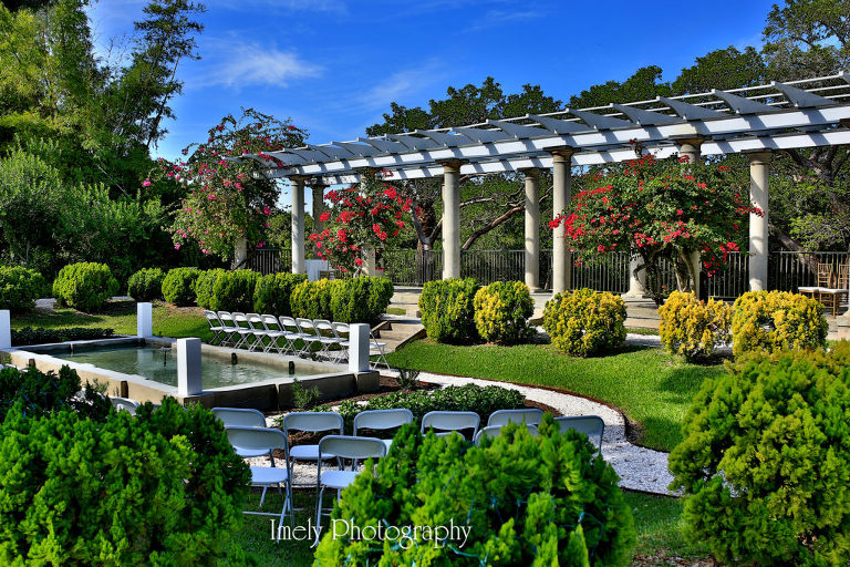 Romantic Florida Coastal Wedding Ceremony & Reception Setting at The Spanish Point in Osprey FL